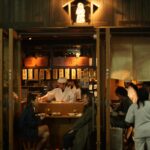 people sitting at the table inside restaurant